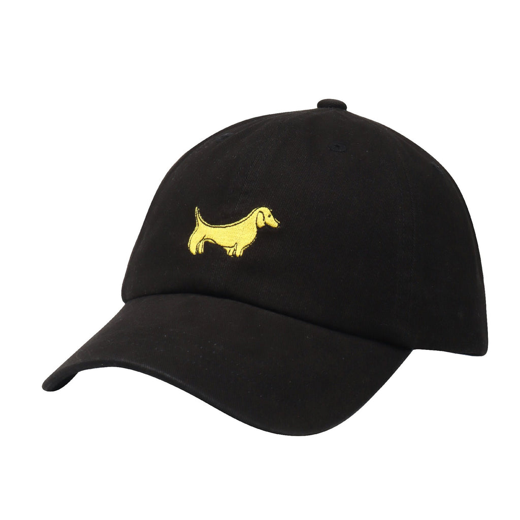 May include: A black baseball cap with a yellow embroidered dachshund on the front