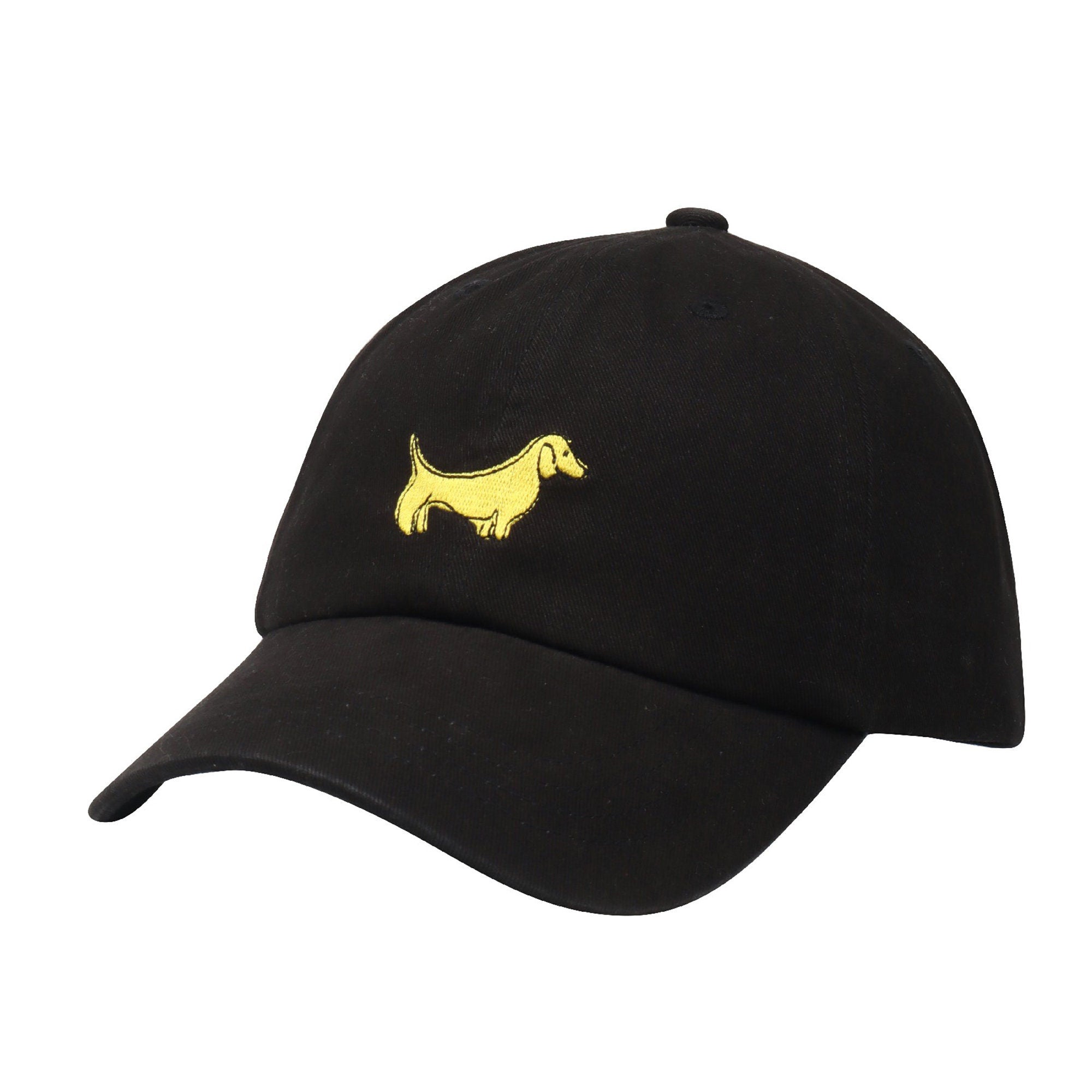 May include: A black baseball cap with a yellow embroidered dachshund on the front