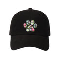May include: A black baseball cap with a floral embroidery design on the front. The embroidery features pink, blue, and white flowers.